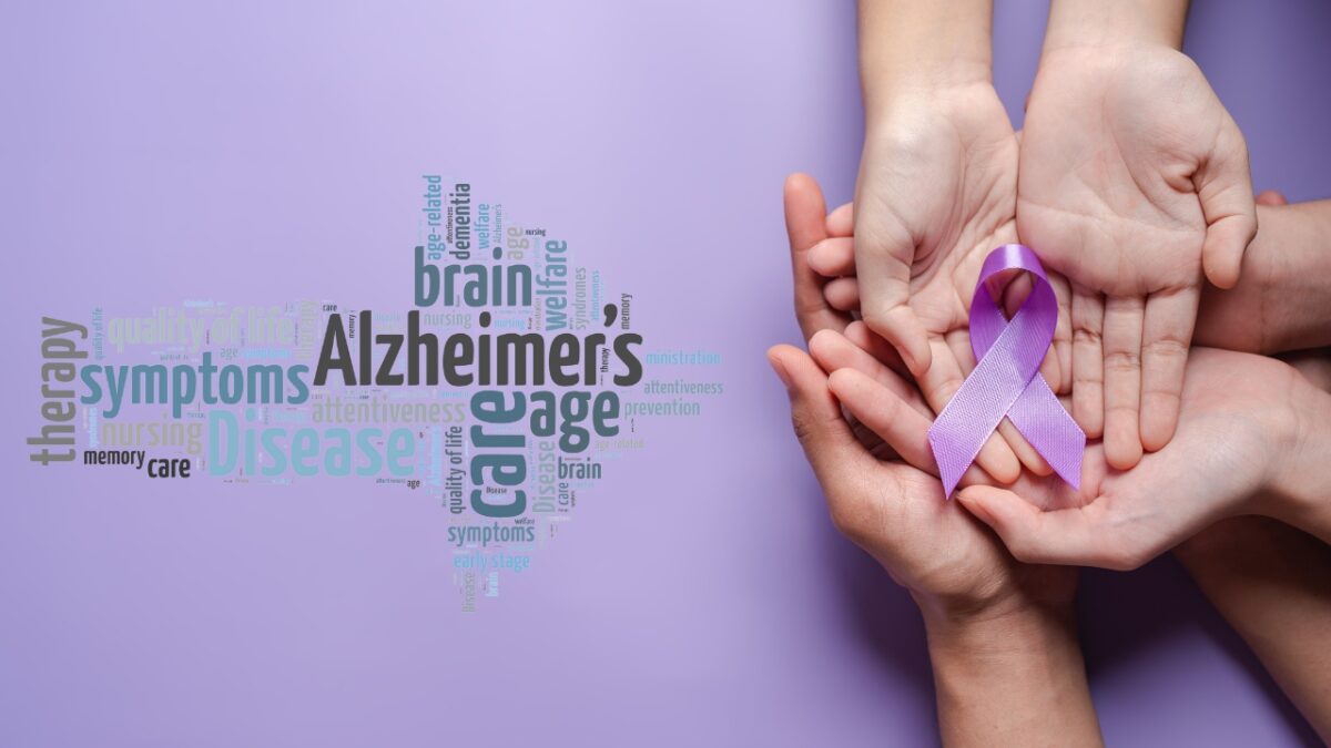 Alzheimer’s related words forming arrow shape with a background picture of hands with purple ribbon.