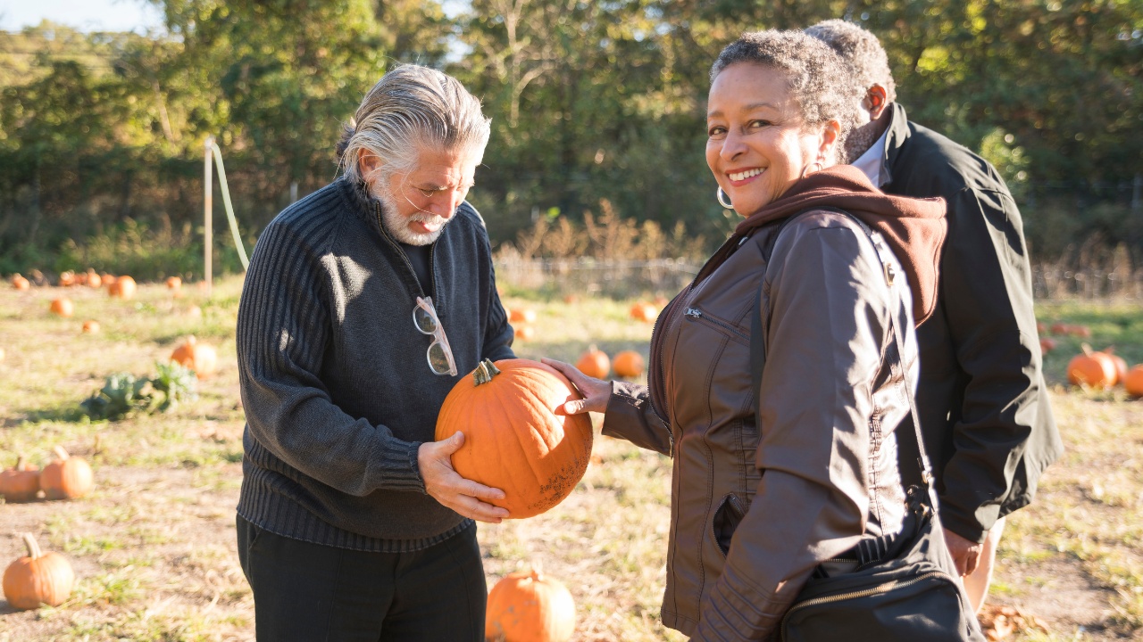 Three seniors visit a Pumpkin Patch as part of the Fall Season Activities.