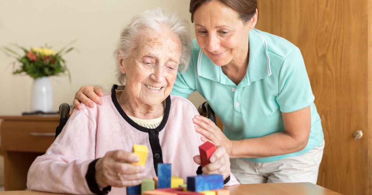 Senior with dementia and her caregiver.