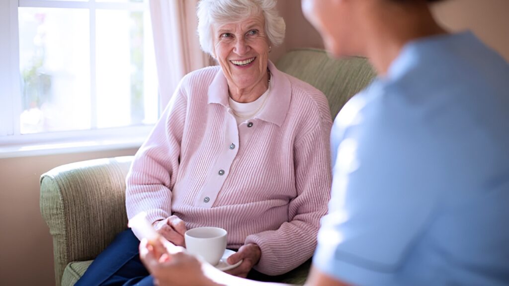 female senior smiling to her caregiver