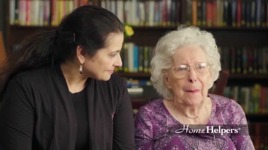 Caregiver supporting senior on managing anxiety.