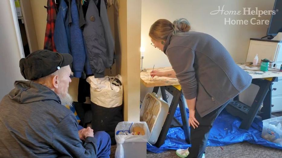 Caregiver providing companion care and safety support