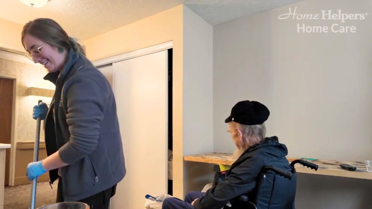 Home health aide helping senior when they start Home Care