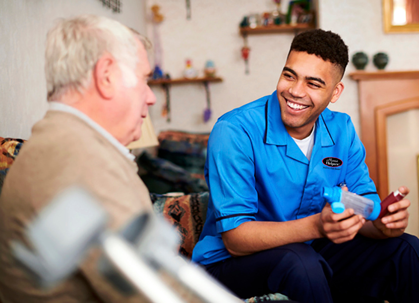 caregiver assisting senior after hospital discharge 