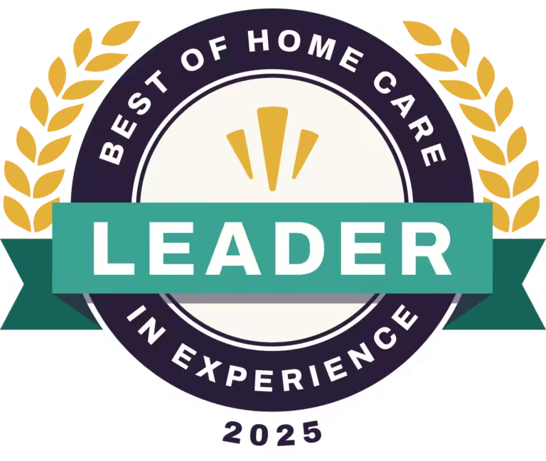 Badge with gold laurels, reading “Best of Home Care Leader in Experience 2025” in a dark circle, with a green ribbon and gold accents.