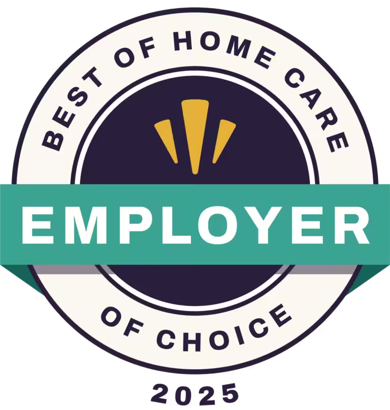 Circular badge reading “Best of Home Care Employer of Choice 2025” with a green banner across the center stating Employer. Three yellow shapes are above the banner inside a dark circle.