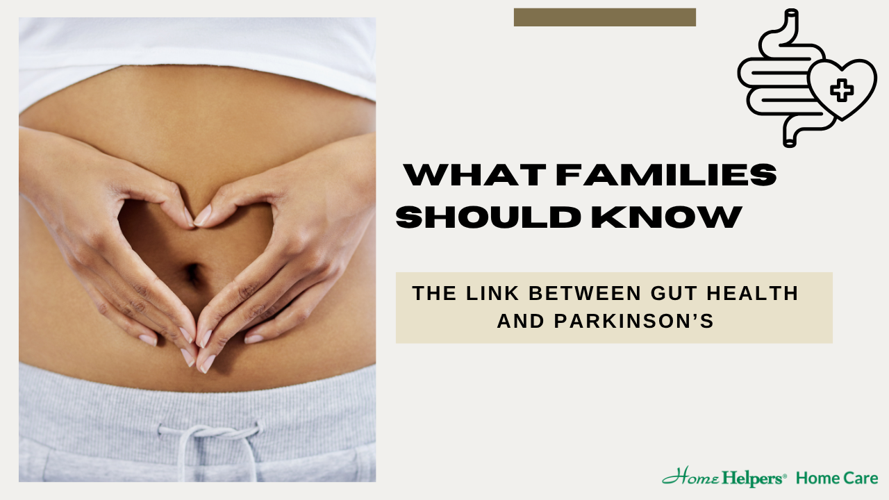 Close-up of a person making a heart shape with their hands over their bare stomach. Text reads: “What Families Should Know: The Link Between Gut Health and Parkinson’s.” Home Helpers Home Care logo in the corner.