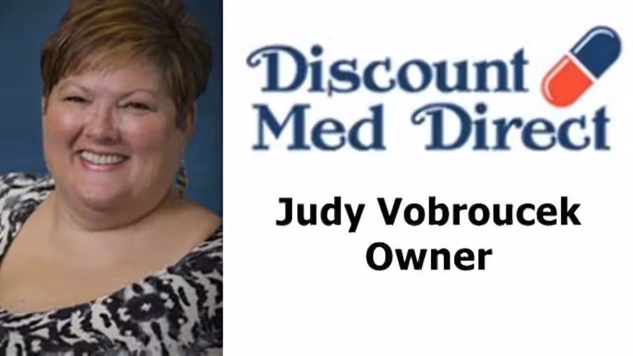 Smiling woman with short hair on the left; on the right, the Discount Med Direct logo, and below it, text reads: Judy Vobroucek Owner.