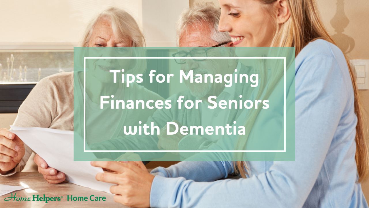 Three people sit at a table reviewing documents, with a green overlay containing the text: Tips for Managing Finances for Seniors with Dementia. The Home Helpers Home Care logo is in the corner.
