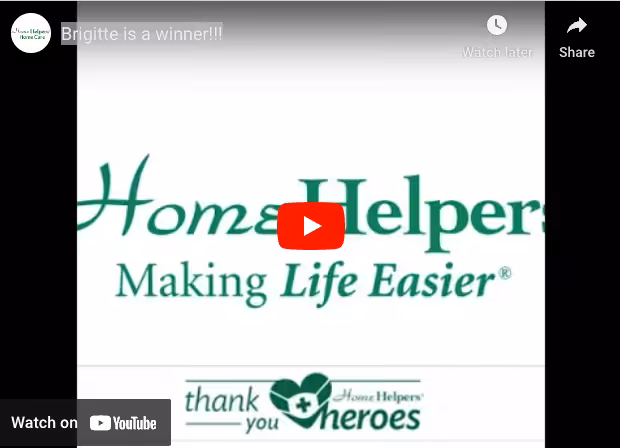 Screenshot of a YouTube video titled Brigitte is a winner!!! featuring the Home Helpers logo, slogan Making Life Easier, and a thank you heroes banner at the bottom with a heart icon.