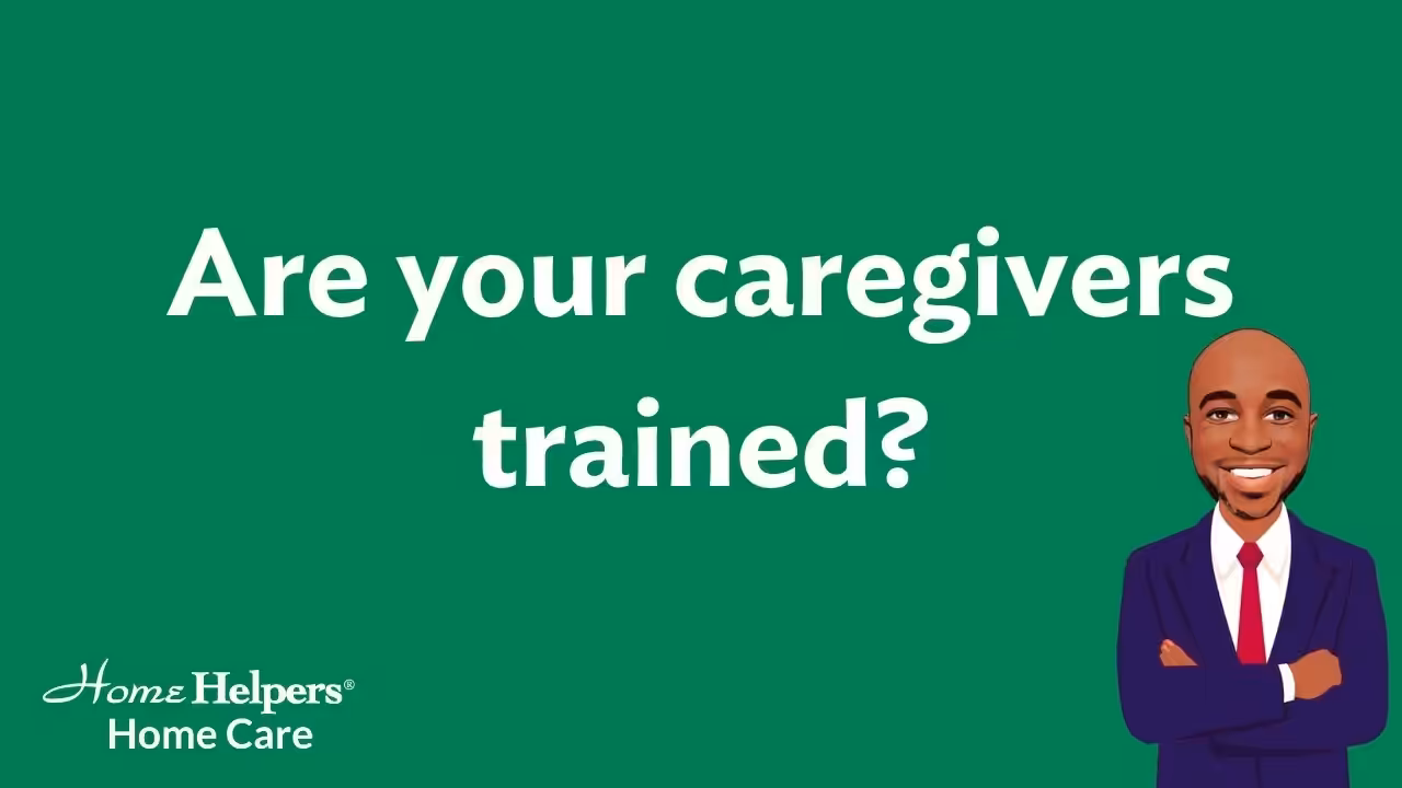 Text on a green background reads Are your caregivers trained? In the bottom left corner is the Home Helpers Home Care logo. On the right, there is an illustration of a smiling man in a suit with folded arms.