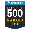A badge with the text Entrepreneur Franchise 500 Ranked 2019 in white and yellow letters on a black background.