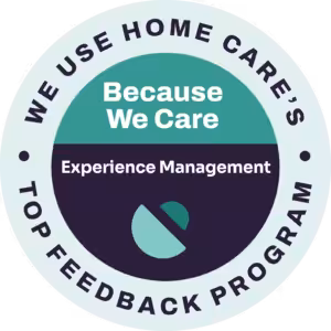 Circular badge with text: WE USE HOME CARES TOP FEEDBACK PROGRAM around the edge. Inside, it says Because We Care, Experience Management, and features a simple abstract logo. Colors are teal, white, and navy.